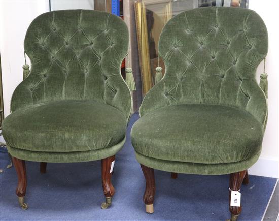 A pair of similar nursing chairs